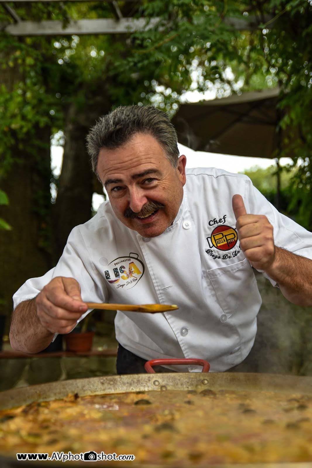 Chef Diego preparing paella